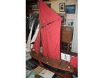 The Thames barge Normanhurst served as a boys club in the 1950’s. The River Police were closely associated with this venture and the barge was moored close to Wapping police station. The model is accompanied by historical documents from the period.